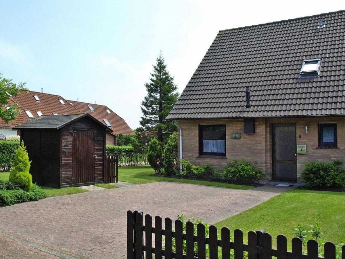 Ferienhaus Mit Grossem Garten In Neßmersiel Buitenkant foto